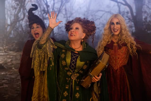 Kathy Najimy as Mary Sanderson, Bette Midler as Winifred Sanderson, and Sarah Jessica Parker as Sarah Sanderson in Hocus Pocus 2 (Photo: Disney/Matt Kennedy)