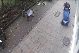 Screen Grab from footage of a pigeon crushed by a man in a scooter.