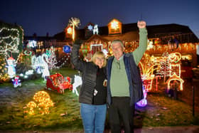 Malcolm Molloy, 64, and his wife Wendy, 62, from Worcestershire wow their neighbours with Christmas lights every year