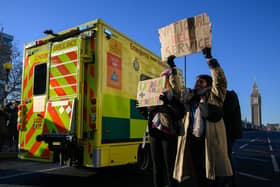 A group of fraudsters have been posing as ambulance staff and knocking on doors asking for financial support ahead of upcoming industrial action.