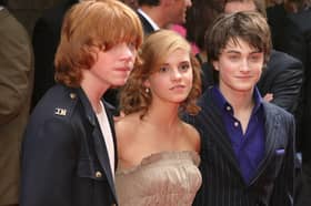 Actor Rupert Grint, Actress Emma Watson, and Actor Daniele Radcliffe attend the Premiere of Harry Potter  (Thos Robinson/Getty Images)