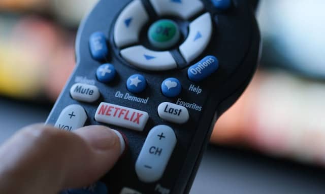 With tough competition from fellow streaming services, Netflix is dedicated to cracking down on password sharing amongst its users (Photo by CHRIS DELMAS/AFP via Getty Images)