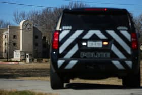 A police vehicle sits outside of the Congregation Beth Israel Synagogue in Colleyville, Texas, some 25 miles (40 kilometers) west of Dallas (Photo by Andy JACOBSOHN / AFP) (Photo by ANDY JACOBSOHN/AFP via Getty Images)