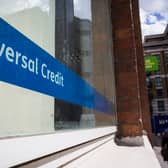  A Universal Credit sign in the window of the Job Centre in Westminster.