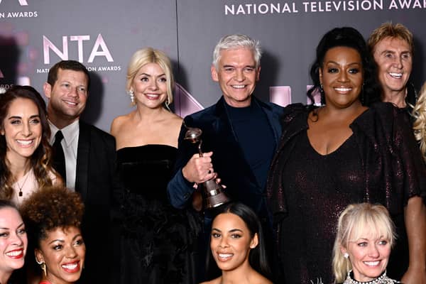 OCTOBER 13:  The team from 'This Morning' including Holly Willoughby, Phillip Schofield and Rochelle Humes, with the Best Daytime award for 'This Morning', in the winners' room at the National Television Awards 2022 at OVO Arena Wembley on October 13, 2022 in London, England. (Photo by Gareth Cattermole/Getty Images)