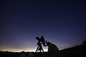 Members of the York Astronomical Society prepare to view the annual Perseids meteor shower in the village of Rufforth, near York, in August 2015 (Photo: OLI SCARFF/AFP via Getty Images)