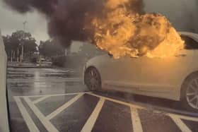 Watch the terrifying moment childen were left in a car that caught fire