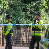 Police on Magdala Road, Nottingham where a man was found dead.