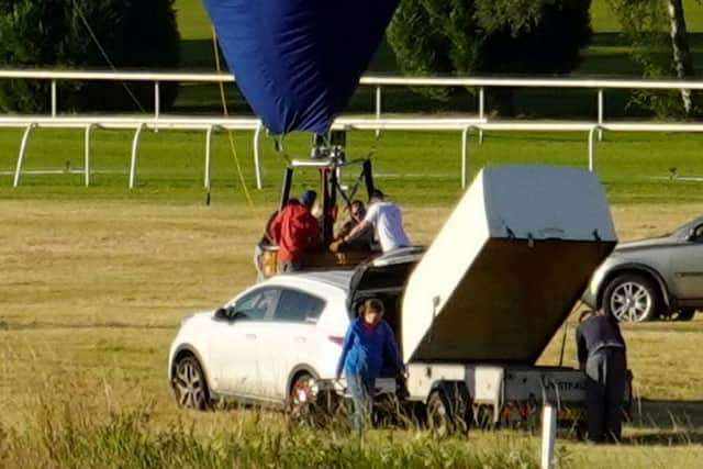 The blue balloon on the ground with the red top was the one involved in Sunday’s tragedy. 