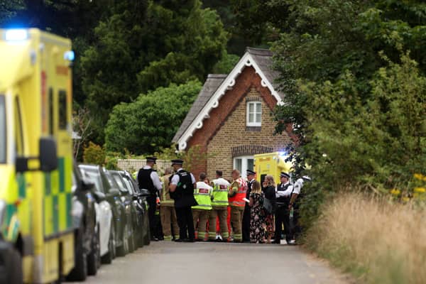 Wimbledon car crash: One child dies and woman arrested after Land Rover crashes into school