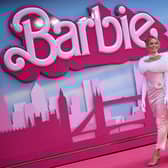 Australian actress Margot Robbie poses on the pink carpet upon arrival for the European premiere of “Barbie” in central London.