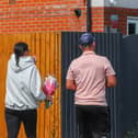 Members of the community lay flowers at the scene of the crash on Turnstone Road, Walsall.