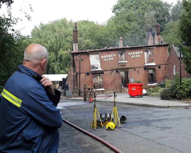 Fire crews at The Crooked House pub