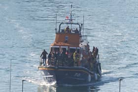 Over 50 people have been rescued after a migrant boat sunk in the Channel on Saturday morning