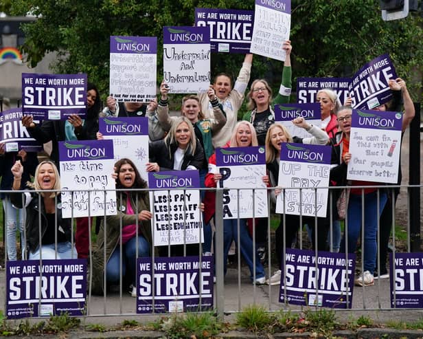 School support workers, cleaning staff and janitors are currently on strike in Scotland as the Unison union remains locked in a pay dispute with education chiefs. (Credit: Jane Barlow/PA Wire)