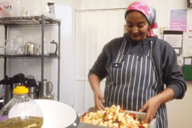 One of the Kitchen of Hope chefs preparing some food