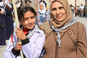 Mahmoud's mother and one of his sisters