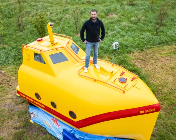 A lifeboat found floating in the sea has been turned into a real-life Yellow Submarine for glamping. 