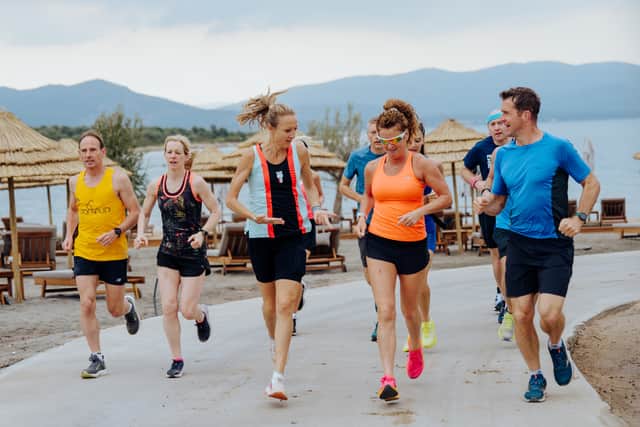 Paula Radcliffe leads a running session at Anda Barut