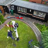 Derek Burwell, 83, spends 30 years building miniature railway in garden.