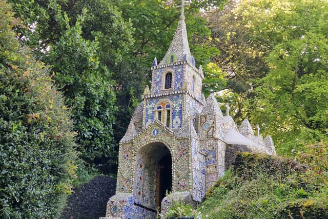 The Little Chapel is decorated with pebbles, shells and broken China