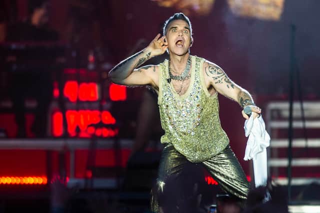 Robbie Williams is set for his only UK performance in 2024 as he headlines BST Hyde Park in July 2024. Are there still tickets to see the former Take That great in London though? (Credit: Tim Kildeborg Jensen / Ritzau Scanpix / AFP)