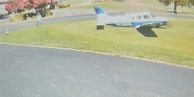 Plane smashes into golf course narrowly missing golfer.