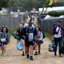 Some festivalgoers at Glastonbury Festival. 
