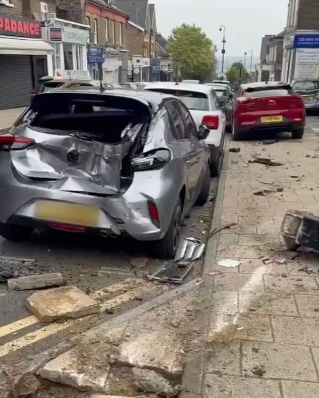 Parked cars were badly damaged in the crash outside Simple Food and Coffee in Buckhurst in Essex.