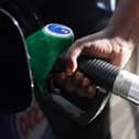 A driver pumps fuel at an Esso Tesco petrol station in 2022 (Photo: Hollie Adams/Getty Images)