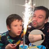 Non-verbal autistic boy communicates using dad's alphabet tattoo