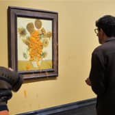 Just Stop Oil throw soup over Van Gogh's Sunflowers for second time.