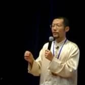 A video grab of Hongchi Xiao conducting a presentation on Paida Lajin therapy.