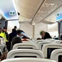 A group of seven drunk and unruly passengers were arrested by armed police officers at Gatwick Airport on October 10 after causing chaos on a flight from Cancun.
