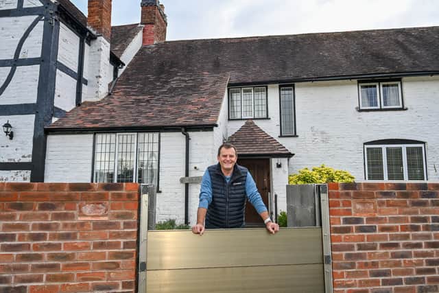 Nick Lupton 'Worcestershire's King Canute' with his flood defence wall around his home in Pixham, Worcestershire.