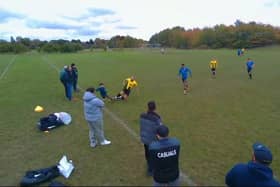 Reggie, 12, accidentally being slide tackled by non-league footballer Terry.