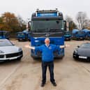 Jimmy Callaghan, Omaze double Porsche Early Bird winner with his brand new Cayenne and Boxter cars alongside his work lorry. 