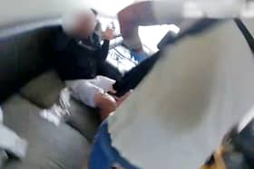 Two bungling drug dealers were caught red-handed after police found one sitting on the sofa weighing piles of cocaine. 