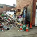 The huge mountain of rubbish has built up at a property in Dalkeith Street