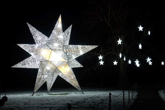 Supernova, a towering, polished, stainless steel star, looks like a spaceship has landed in the groounds.