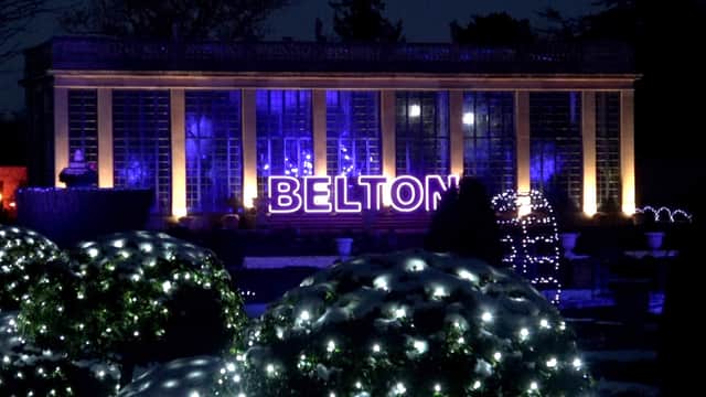 A huge lit Belton sign outside The Orangery welcomes visitors to Christmas At Belton 2024