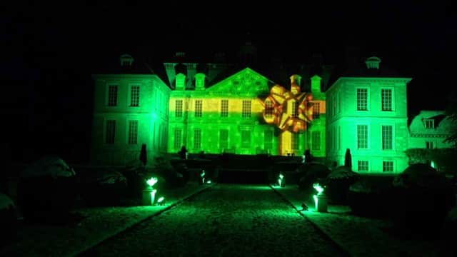 Belton House is the biggest star of he show - turned into a Christmas gift, with a bow in it, in a fabulous new animation projected onto the building.