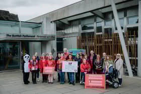 ME Action UK campaigners gather in Parliament Square to demand the £100s millions missing from ME research.