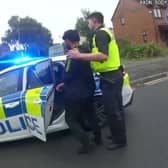 This is the dramatic moment two student police officers chased down a rapist in the street after he attacked a woman in a park. 
