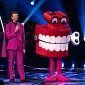 Fans think that Teeth could be Alan Carr or James Buckley.
