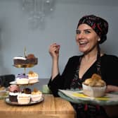 Photo of business owner with vegan cupcakes