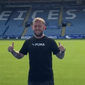 Photo of Matthew getting his photo taken in a Premier League football stadium
