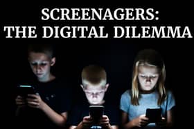 A photo of children using smartphones