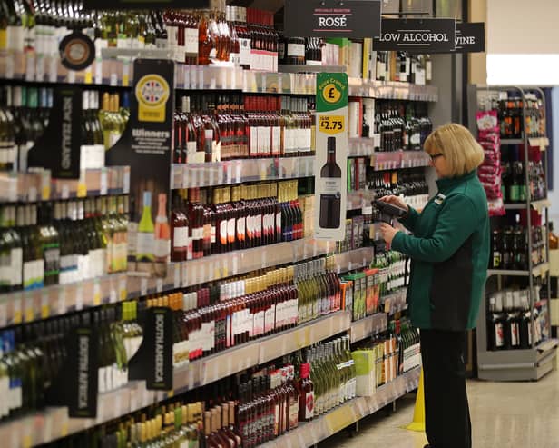 A member of staff scans groceries inside Rochdale's Morrisons supermarket in 2017 (Photo: Christopher Furlong/Getty Images)