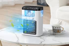 The cooling unit sprays a mist towards you, giving you relief from the heat